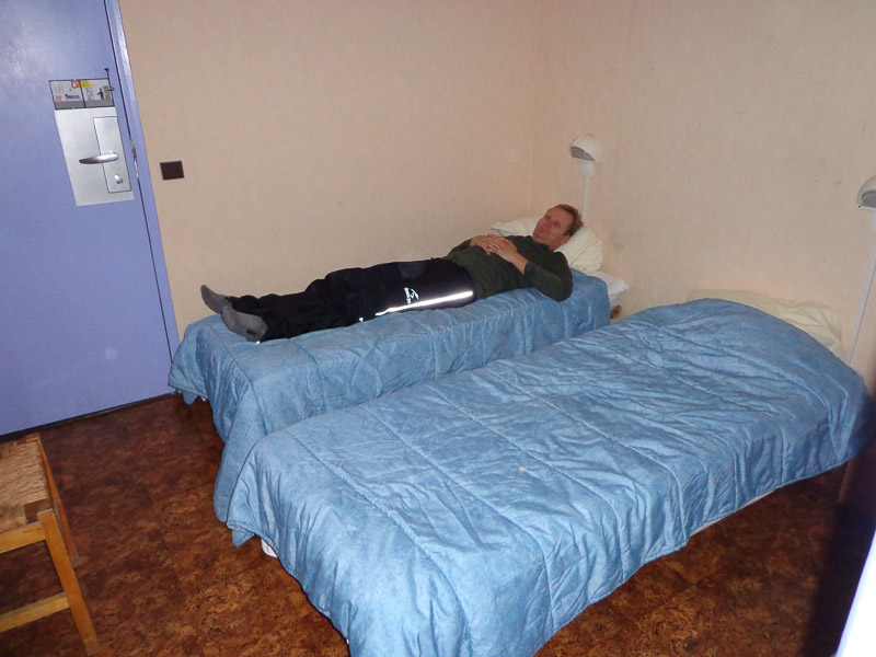 Mark relaxing in our surprisingly spacious hostel room